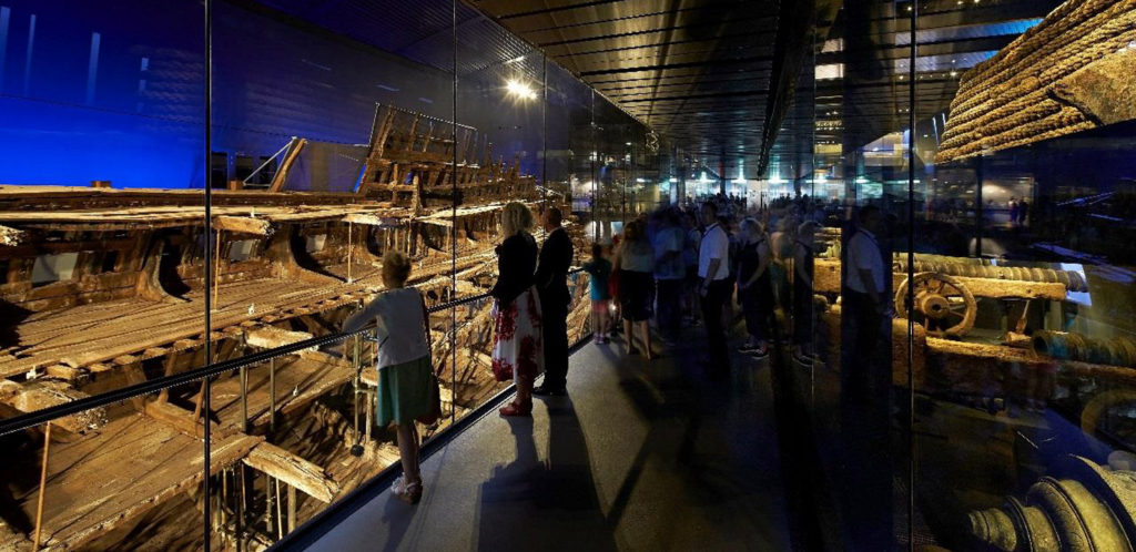 people viewing the Mary Rose inside the exhibition
